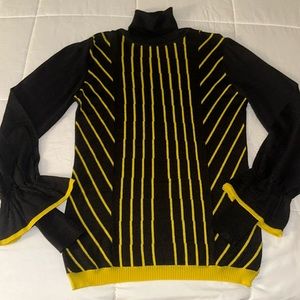 Woman’s ADL black and yellow turtleneck blouse size medium